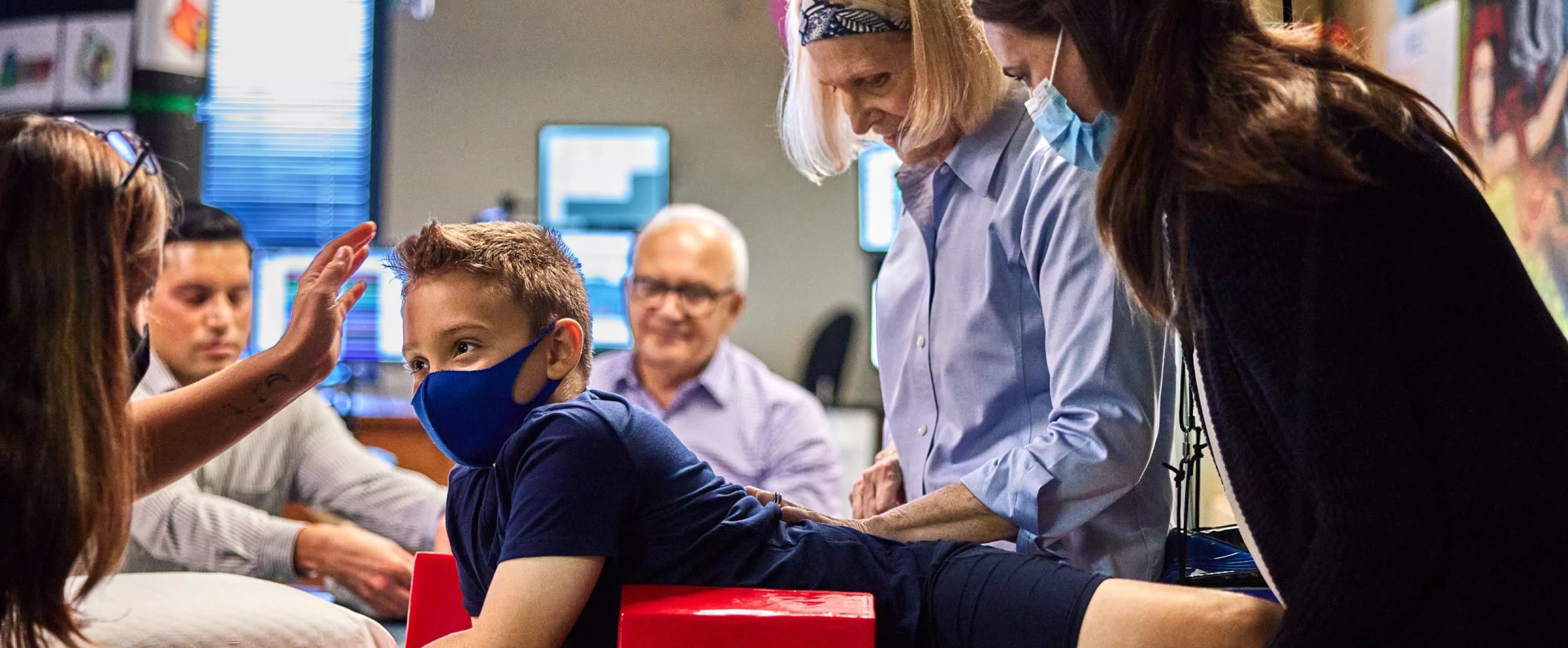 Andrea Behrman is doing research on and analyzing a child's spinal cord.