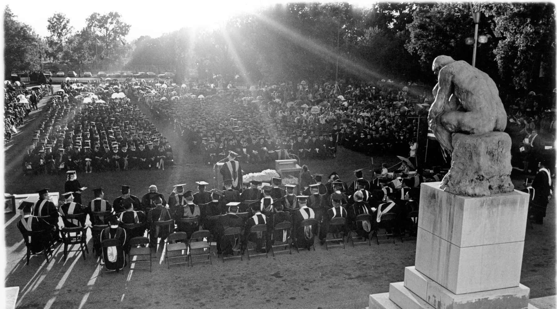 A view of commencement on the lawn, from the 1960s