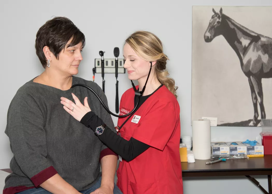 Nursing student examines a patient of the Racing Center