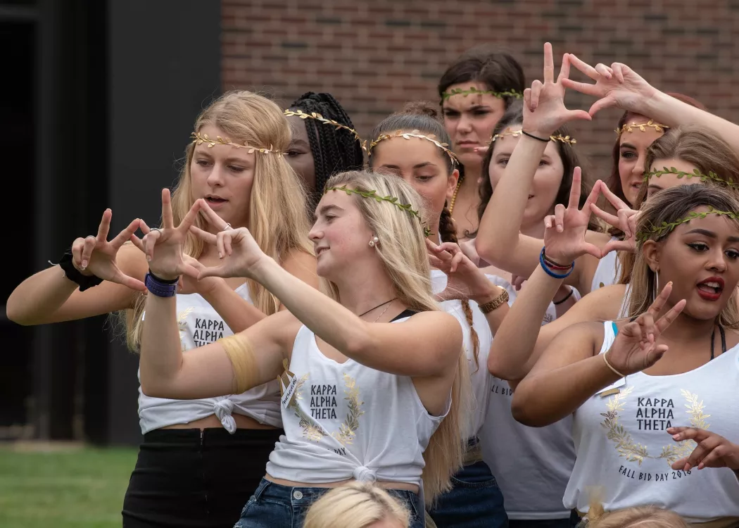 A group of sorority pledges performing at Bid Day