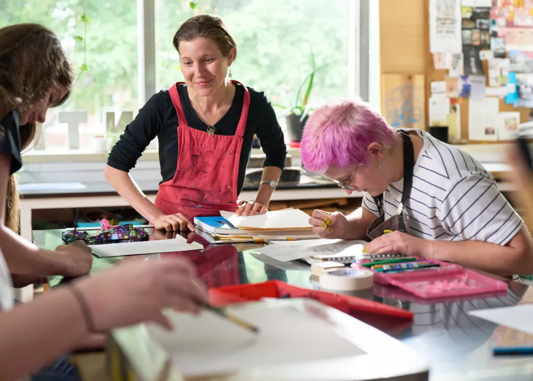 Rachel Singel, Associate Professor teaching a printmaking studio course