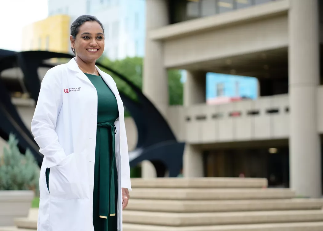 Female doctor posing for the campaign in front of HSC campus.
